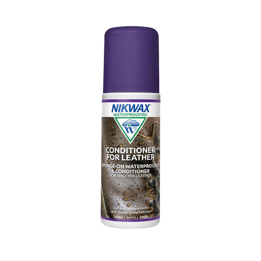 Bottle of Nikwax Conditioner for Leather, with a label showing a pair of boots with water pooling on the surface. Bottle is white with a purple cap